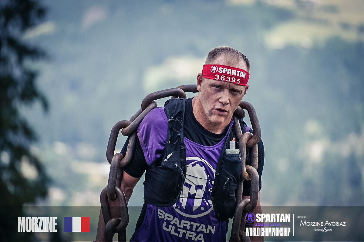 Niklas Lindahl carrying chains at the Spartan Ultra World Championship in Morzine